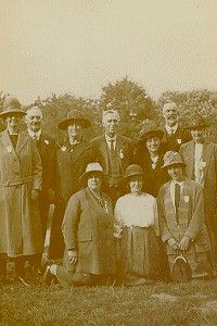 Group of people in a large garden or park
