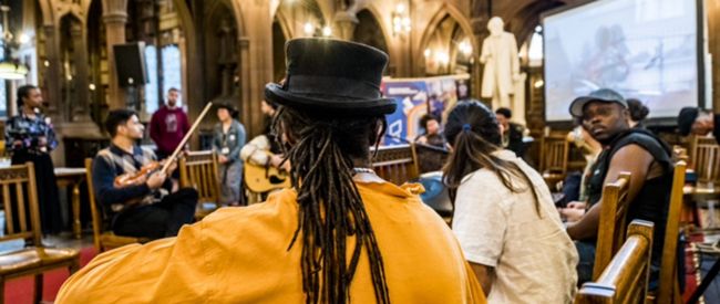 Musicians performing as part of Migrant Voices Takeover event