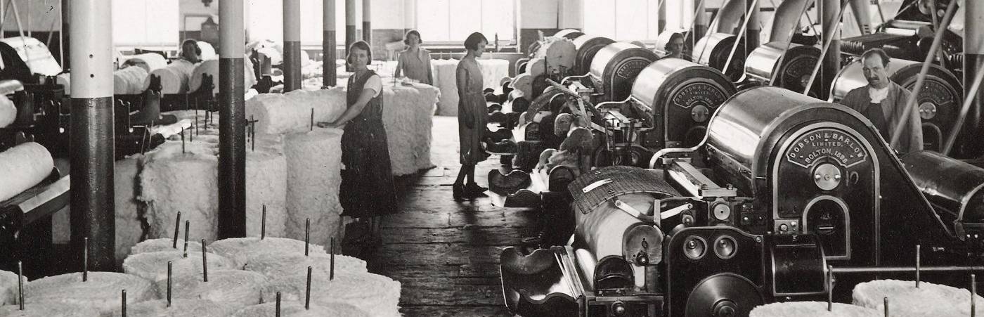 Women working on machinery in cotton mill (Wigan)