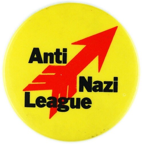 Ant-Nazi League badge, Red and black design on yellow circular badge