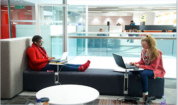 Two students sat talking