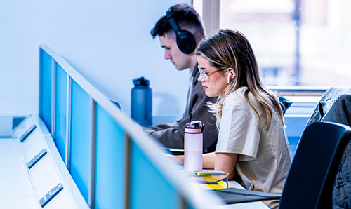 Two students revising in the Library