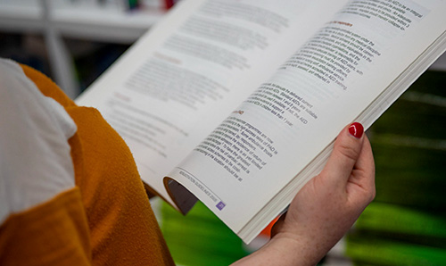 Person holding book