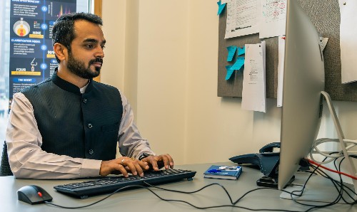 Staff member using computer